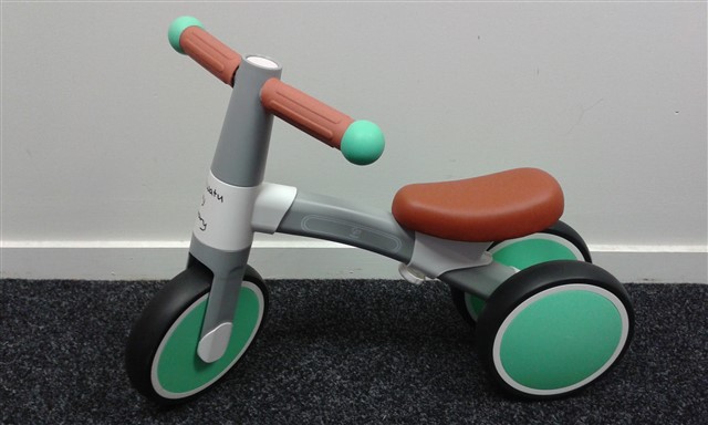 first balance bike